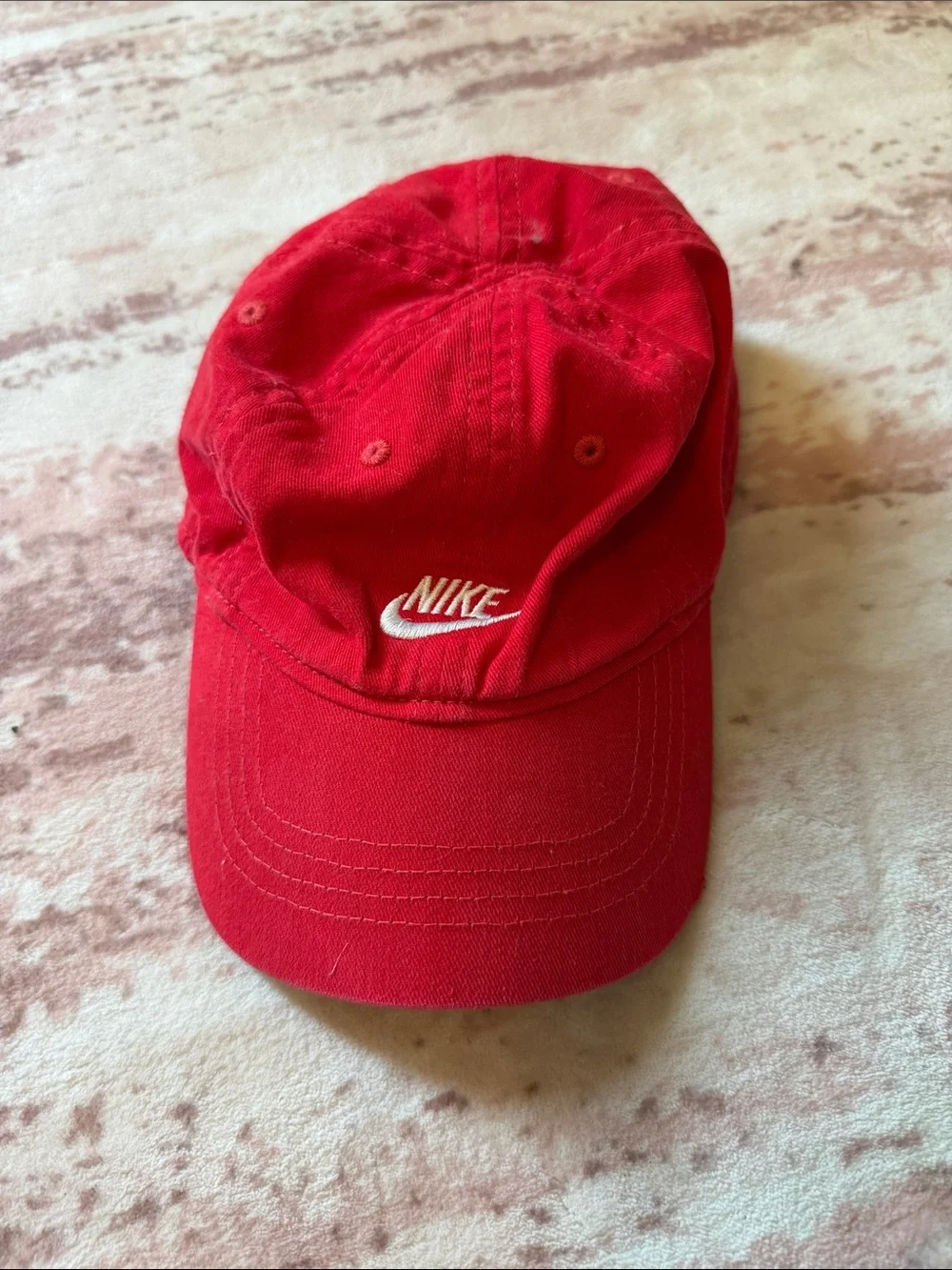 Nike Red Cap with White Swoosh Logo
